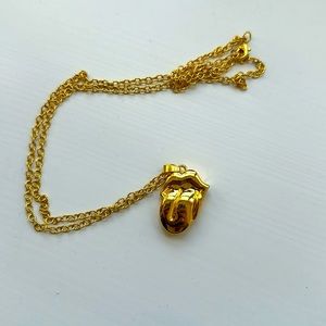 Gold-colored Rolling Stones necklace
